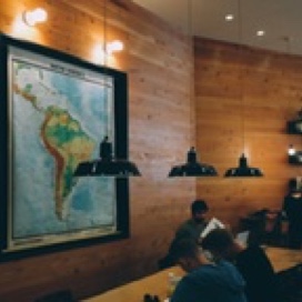 classroom setting with world map on wall