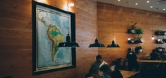 classroom setting wider with world map on wall
